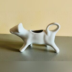White Ceramic Cow Creamer crafted from durable white porcelain.